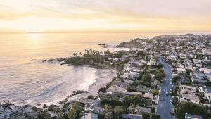 A coast in Southern California surrounded by homes.