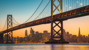 The skyline of San Francisco behind the Golden Gate Bridge.